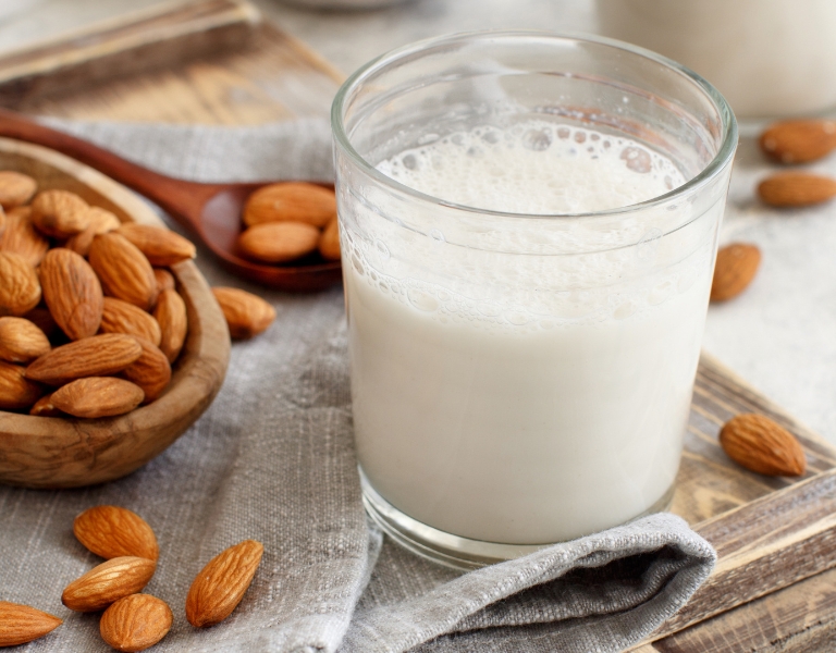jar of plant based heavy cream using almonds and coconut